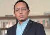 Transformasi Karier Hasan Nasbi, Dari PCO ke Komisaris BUMN Energi